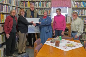 Left to right: Arlene Rhodes, President, Board of Trustees: Brenda Reilly of BSNB; Fred Baily; Debra Flint, Library Manager; Judith Knowlton; Jim Hodsell