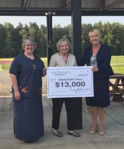 Assemblywoman Mary Beth Walsh presents a check for $13,000 to the Galway Public Library to help in the library's fund raising efforts toward construction of the new library, at the Community Ice Cream Social on August 25. Left to right: Deb Flint, Galway Public Library Manager, Arlene Rhodes, President of the library's Board of Directors, and Assemblywoman Mary Beth Walsh.