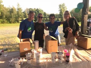 Friends of the Galway Public Library scooping ice cream donated by Stewart's Shops, at the Community Ice Cream Social on August 25. 