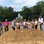 Board members shoveling