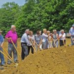 Board members shoveling