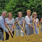 Dignitaries shoveling