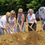 Dignitaries shoveling