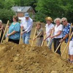 Board members shoveling