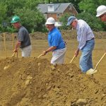 Men shoveling