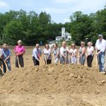 Library board & architects shoveling