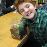 Boy with terrarium