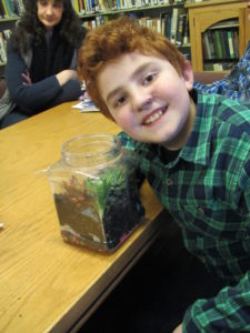 Boy with terrarium