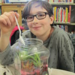 Boy with terrarium