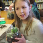 Girl with terrarium