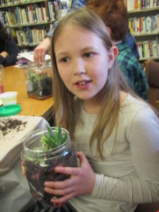 Girl with terrarium