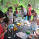 Kids making bottle rockets.